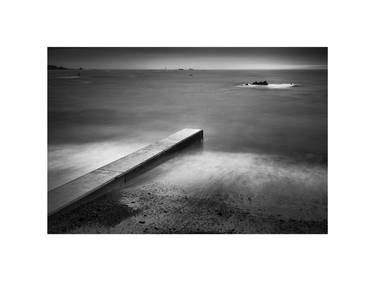 Concrete, rocks, and distant lighthouse, at L'Eree Bay. - Limited Edition 2 of 100 thumb