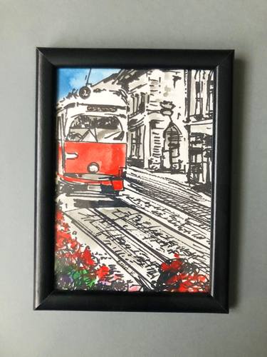 Red tram in Miskolc (Hungary) thumb