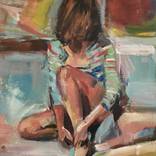 Woman adjusting her shoe by Samuel Burton