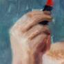 Detail of the hand holding the lipstick