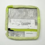 Textile Memory: Headlines & Cuff Fragment in Green Soft Frame by Andrea Hauer