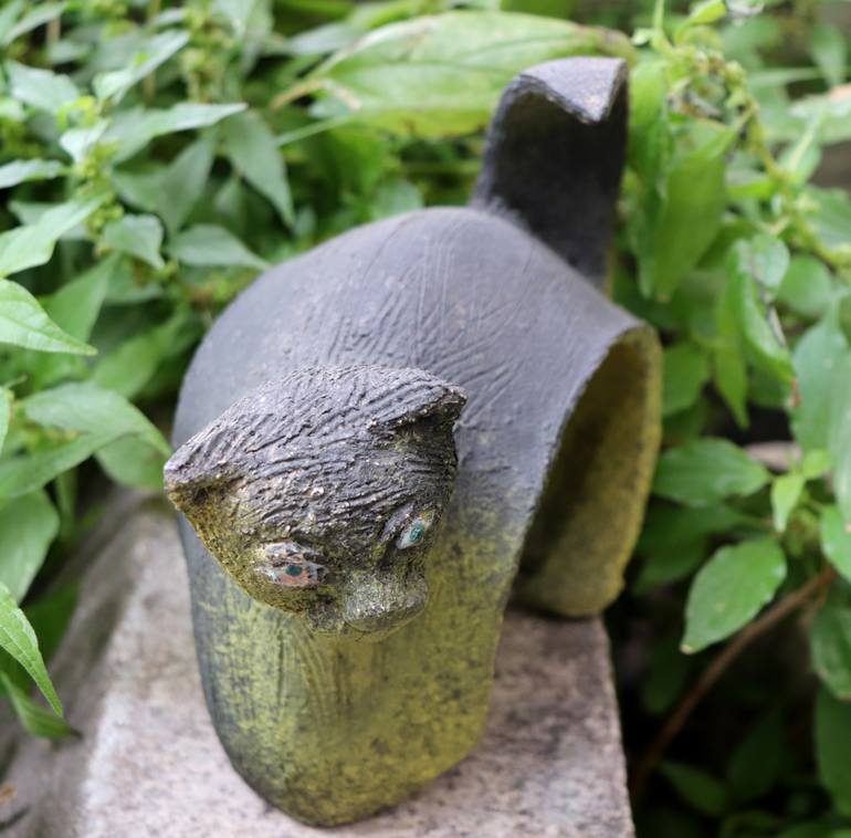 Ceramic cat . - Print