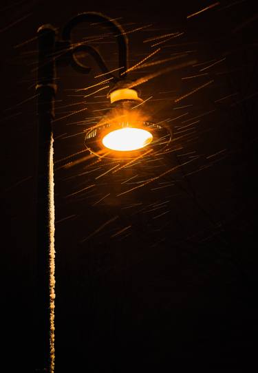 Street Light during a snow storm thumb