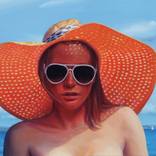 Girl with hat by Nurhan Altay