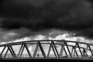 bridge under a troubled sky thumb