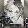 On the easel. This lady is 4 feet wide by 5 feet high.