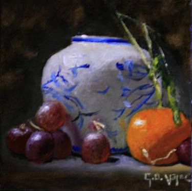 white vase with grapes and clementine thumb