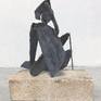 Abstract female figure inspired by the beauty and strength of the feminine form, in a seated gesture. Brutalism, cubistic. Brick base 9 x 5 x 3 can be included.