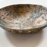 One-of-a-kind ceramic pieces, using expressive lines (sgraffito technique) to depict images of women, birds and other themes. Influenced by various cultures, these pieces are glazed in rich, earthy colors and imbued with a sensuous fluidity that evokes a lyrical and poetic quality. Low fire underglazes and slips are used, along with high fire glazes.