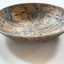 One-of-a-kind ceramic pieces, using expressive lines (sgraffito technique) to depict images of women, birds and other themes. Influenced by various cultures, these pieces are glazed in rich, earthy colors and imbued with a sensuous fluidity that evokes a lyrical and poetic quality. Low fire underglazes and slips are used, along with high fire glazes.