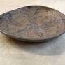 One-of-a-kind ceramic pieces, using expressive lines (sgraffito technique) to depict images of women, birds and other themes. Influenced by various cultures, these pieces are glazed in rich, earthy colors and imbued with a sensuous fluidity that evokes a lyrical and poetic quality. Low fire underglazes and slips are used, along with high fire glazes.