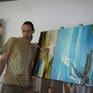 Artist with painting.