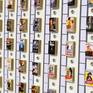 Movie posters from Hollywood cinema printed on matchboxes and pasted on wood. A surreal representation of Western cinema through matchboxes.
The piece comes ready to hang with an open white wooden frame, shipped safely in a wooden crate.