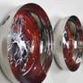 Set of six stainless steel discs 5.5x1.25 inches (14x3.5 cms) each painted with acrylics inside with abstract fluid patterns. They can be placed in any way according to your space. They come with a wooden hanging provision on the back. Artwork shipped safely in a wooden crate.