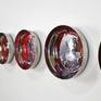 Set of six stainless steel discs 5.5x1.25 inches (14x3.5 cms) each painted with acrylics inside with abstract fluid patterns. They can be placed in any way according to your space. They come with a wooden hanging provision on the back. Artwork shipped safely in a wooden crate.