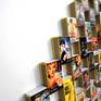 Movie posters from Hollywood cinema printed on matchboxes and pasted on wood. A surreal representation of Western cinema through matchboxes.
The piece comes ready to hang with an open white wooden frame, shipped safely in a wooden crate.