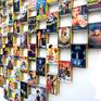 Movie posters from Hollywood cinema printed on matchboxes and pasted on wood. A surreal representation of Western cinema through matchboxes.
The piece comes ready to hang with an open white wooden frame, shipped safely in a wooden crate.