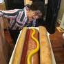 What is America, Hot dogs
bun carved out of limestone, hot dog carved out of travertine
the paper plate is power coated steel