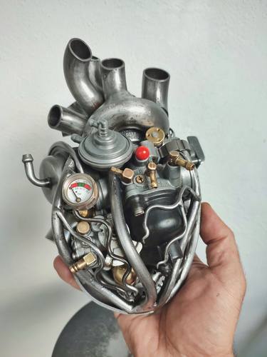Mechanical human heart thumb