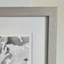 Light grey wooden frame with gallery glass professionally framed