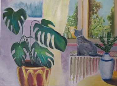 Interior with plant and a cat thumb