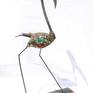 Bird made from recycled parts, clear resin, garden tools and objet trove