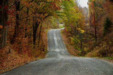Winding Country Road with fall colors thumb