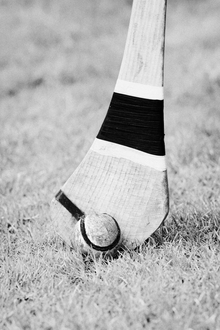 field hockey stick and ball black and white