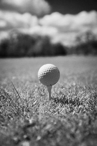 golf ball on tee at start of course thumb