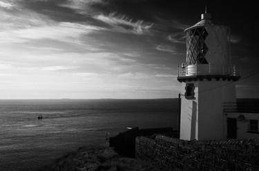 blackhead lighthouse overlooking sea ocean ireland irish thumb