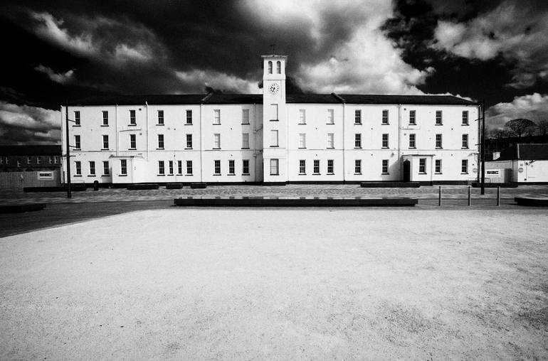 soldiers quarters with clock tower and parade ground in ebrington
