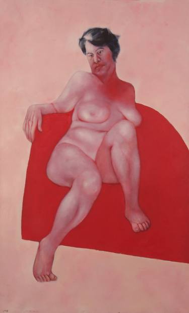 Sitting nude on red sofa thumb