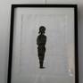On the wall in suggested frame