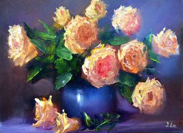 Yellow roses in a blue vase thumb