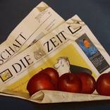 Newspaper with apples by olga formisano