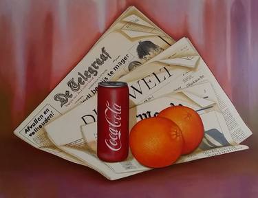 newspaper with can and oranges thumb