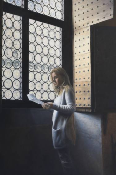 Woman in grey reading a letter thumb