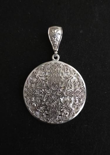 Handmade silver pendant with a complex ornament thumb