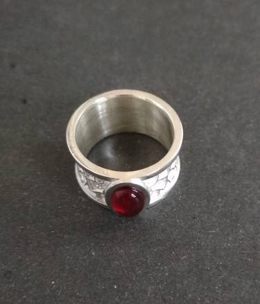 Handmade silver ring with red stone and complex ornament thumb