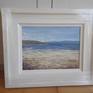 Framed in a white wood gallery frame