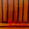 A closeup of the artists signature