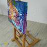On a small easel in my studio- the painted sides.
