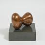 The bronze form is ideal for a desktop or other location where close quarters enable enjoyment.