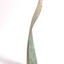 An exploration of texture, subtle colours and variegated patination and colourwash.
A simple sculpture sitting directly on a surface the swirling shape is highly textured on the inner face and is separated from the smooth outside by natural bronze edges.