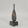 Flask Bronze sculpture on a slate composite base.
