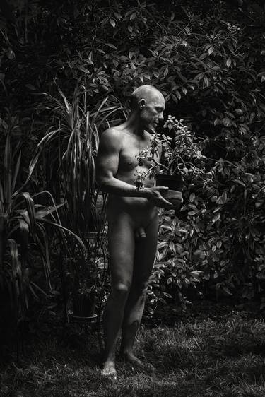 Male nude with plant thumb