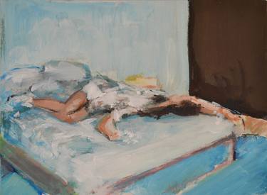 Woman lying on bed thumb