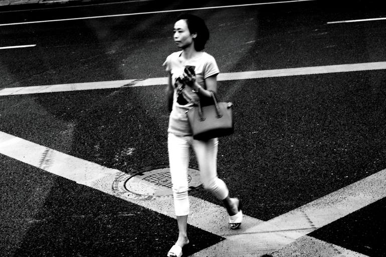 Woman Crossing a Road