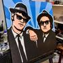 Are you the police? No, ma'am. We're musicians.

Pop art painting of Jake and Elwood from 'The Blues Brothers' classic comedy movie.

As with all my pieces, my aim is for as little brush mark texture on the canvas as possible. 

Acrylic on stretched box canvas. The sides are painted black ready to hang direct, or frame.