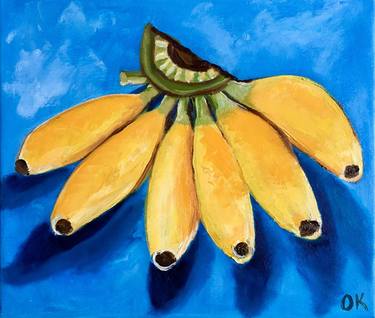Still life with baby bananas on Turquoise background thumb